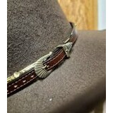 Hattupanta ruskeaa nahkaa, Longhorn koristeilla