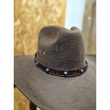 Hattupanta ruskeaa nahkaa, turkooseilla kivillä