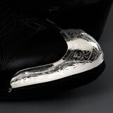 Kapeat kaiverretut kärkiraudat