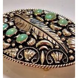 Vyönsolki sulkakuvioitu turkooseilla kivIllä