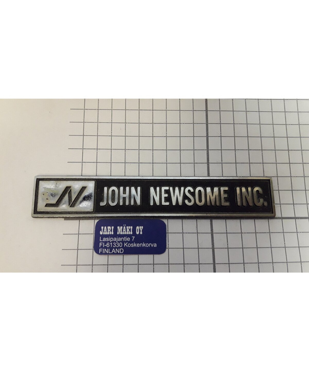 Dealer merkki metallia John Newsome INC