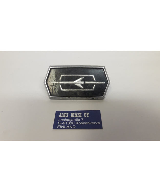 Merkki metallia "Rocket" pölykapseliin Oldsmobile Delta 88 1975