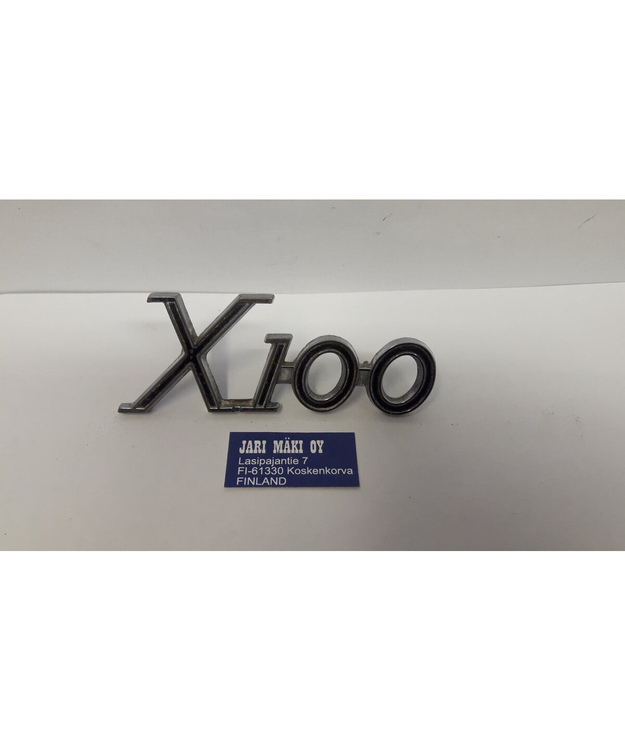 Merkki metallia "X100" lokasuojaan Mercury Marauder 1969-1970