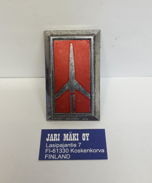 Merkki muovia "Rocket" pölykapselista Oldsmobile Ciera 1983-1986