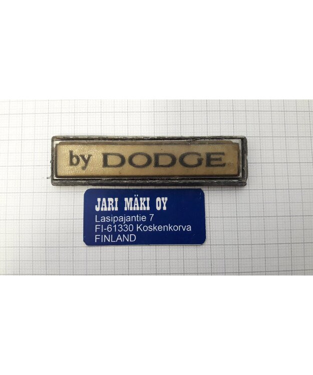 Merkki metallia " By Dodge" 1976-1978