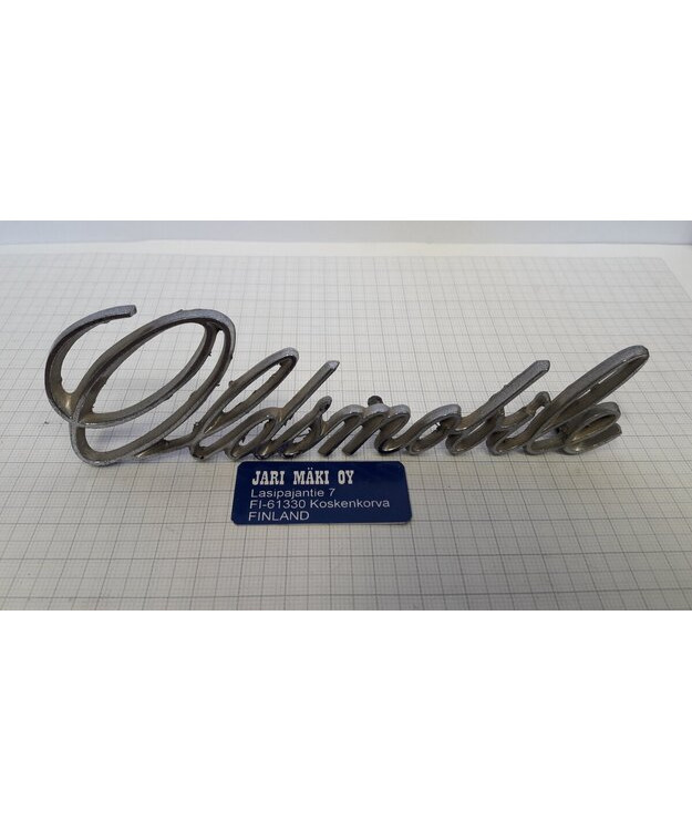 Merkki metallia Oldsmobile Cutlass/Omega 1973-1976