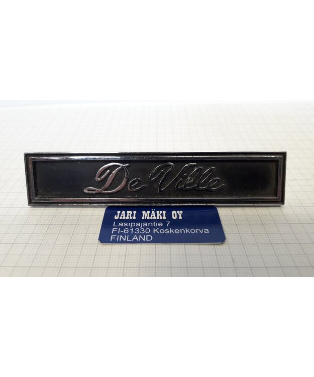 Merkki metallia kojetauluun Cadillac 1966