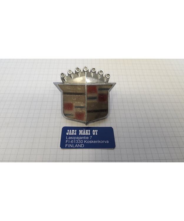 Merkki metallia konepeltiin Cadillac 1973-1974