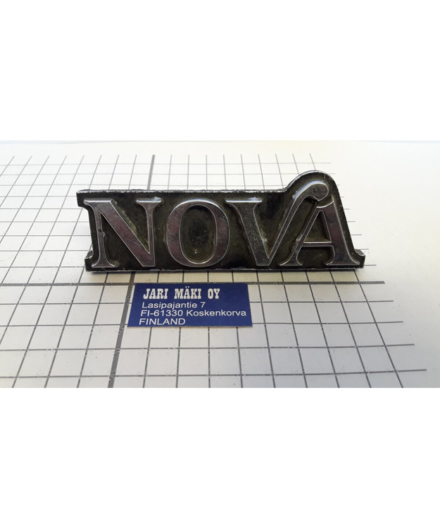 Merkki metallia maskiin Chevrolet Nova 1975-1977