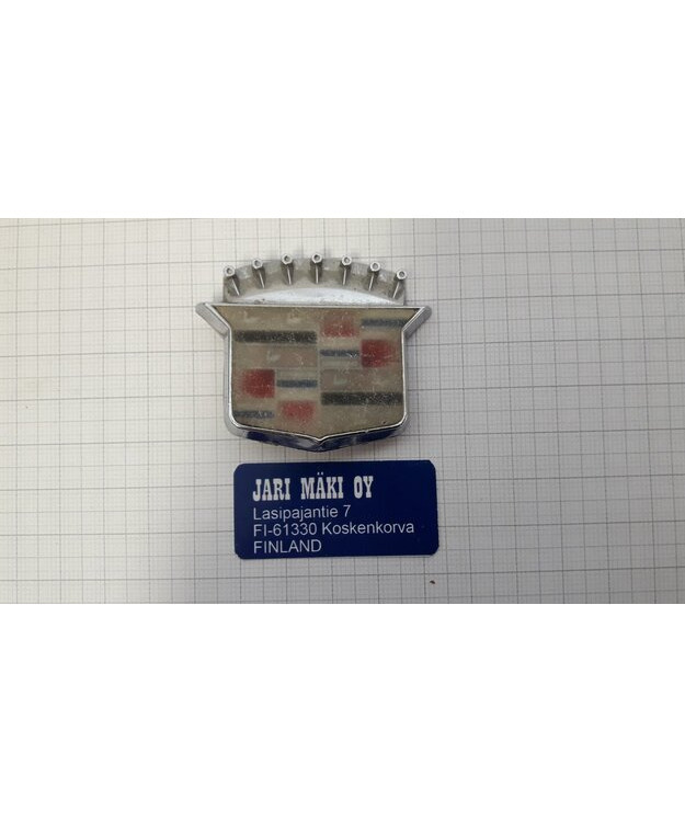 Merkki metallia takaluukun lukonsuoja Cadillac 1976-1979