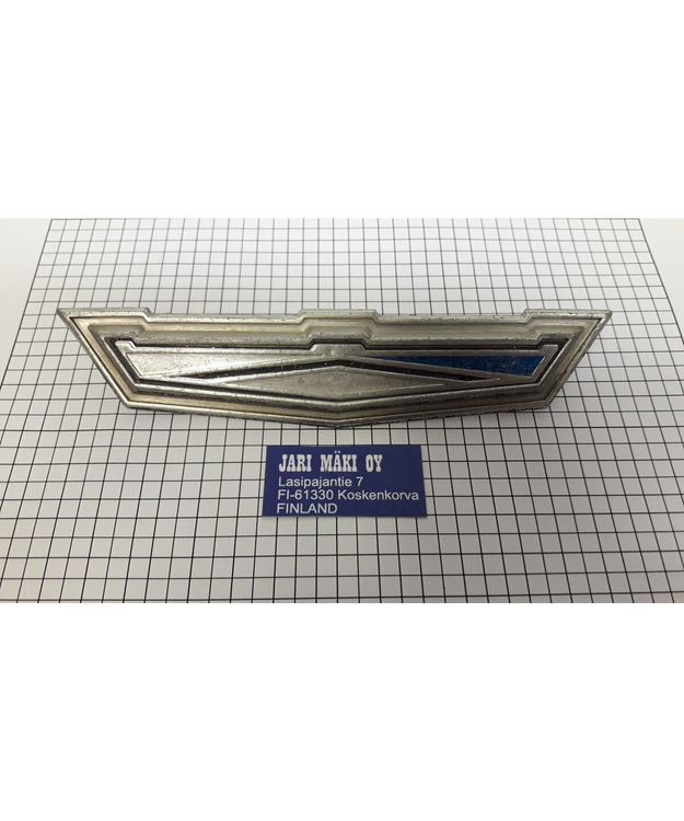 Merkki metallia sivupilarista Ford Galaxie 500 1964