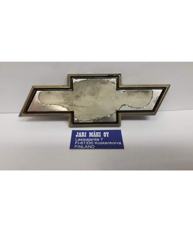 Merkki takaluukun lukon suoja Chevrolet Caprice 1990-1996